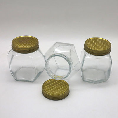Διαφανές βάζο μελιού τροφίμων ασφαλές αεροστεγές, Hexagon βάζα γυαλιού μελιού αποθήκευσης προμηθευτής