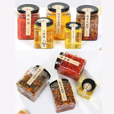 Διαμορφωμένα τετράγωνο βάζα αποθήκευσης τροφίμων γυαλιού με το υλικό γυαλιού σόδας μετάλλων ΚΑΠ βιδών προμηθευτής