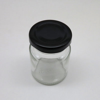 Κενό βάζο μαρμελάδας γυαλιού αποθήκευσης τροφίμων γύρω από τη μορφή ανθεκτική με το καπάκι μετάλλων βιδών προμηθευτής